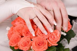 http://www.dreamstime.com/royalty-free-stock-image-hands-newly-wed-rings-bouquet-o-image14622756